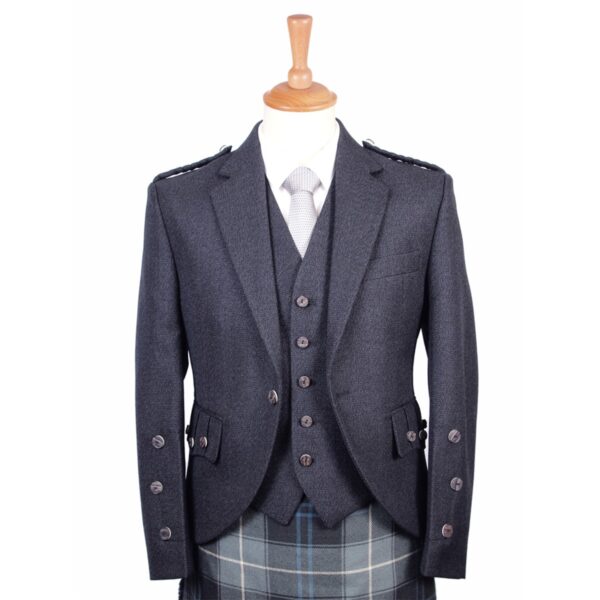 A Scottish kilt paired with a Braemar Tweed Jacket and Vest Set on a mannequin.