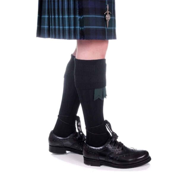 A man wearing black shoes and the Quality Wool Blend Kilt Hose.