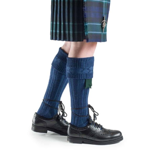 A person wearing the Quality Wool Blend Kilt Hose and a kilt.