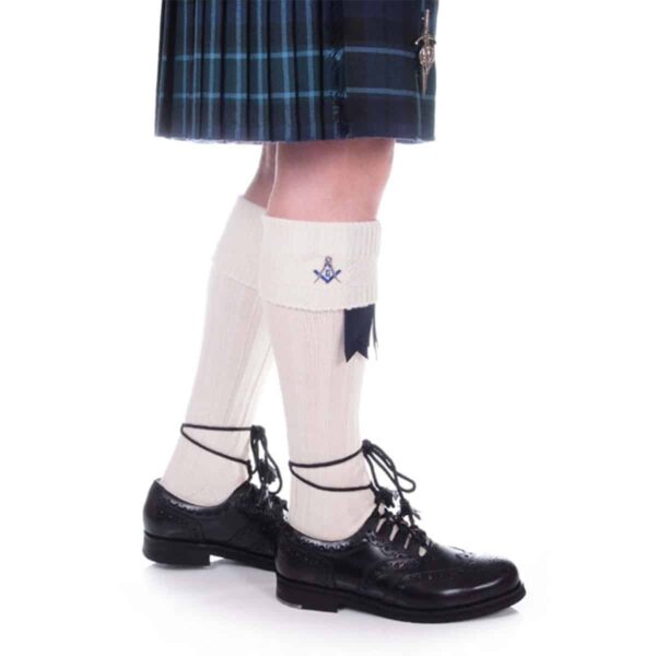 A girl in Masonic Kilt Hose wearing black shoes and socks.