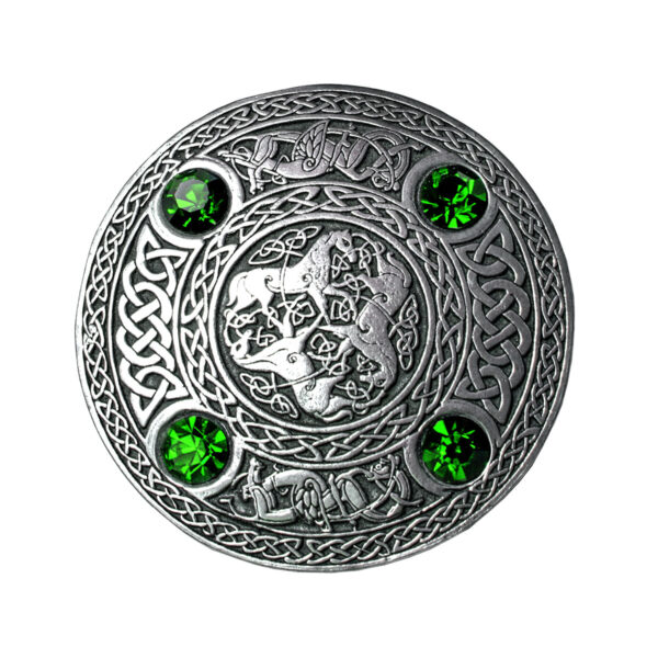 An Inverurie Pewter Plaid Brooch adorned with emerald stones.