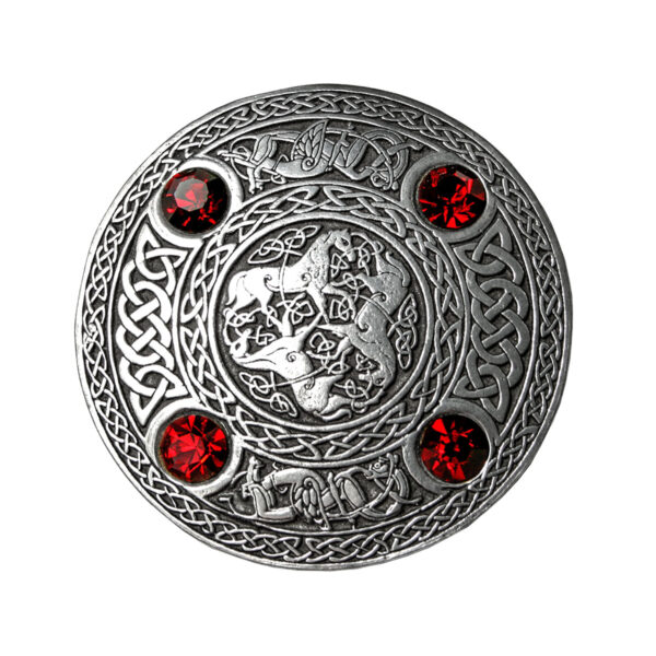 An Inverurie Pewter Plaid Brooch with red stones on it.