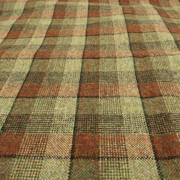 A close up image of a tweed fabric.