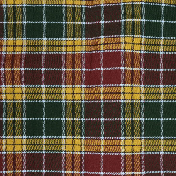 A close up of a green, yellow and red plaid fabric.