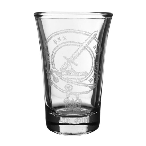 A Clan Crest Shot Glass adorned with a miniature sword.