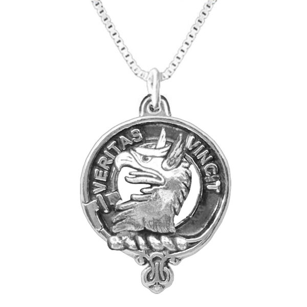 A Clan Crest Pewter Pendant with a dragon on it.