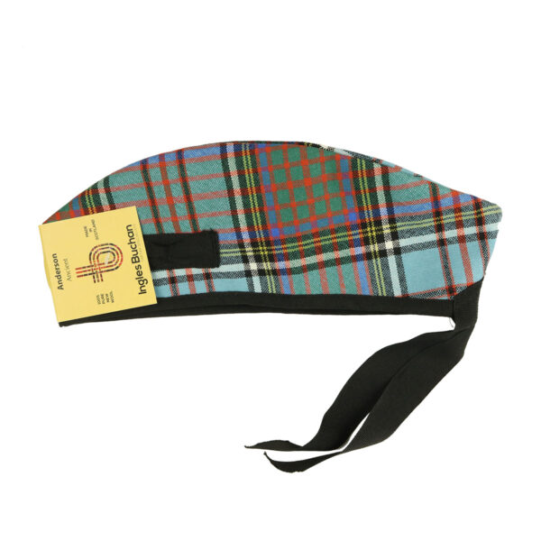 An Anderson Ancient Tartan Glengarry - Spring Weight - Size S with a tag on it, perfect for showcasing Scottish style and heritage.