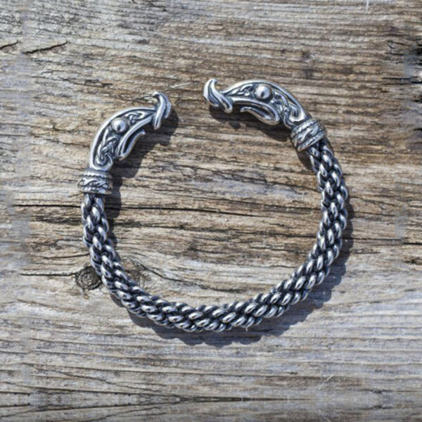 Discover the enigmatic charm of this Viking Dragon Torc Bracelet - Medium Braid, exquisitely crafted with intricate detailing inspired by ancient Norse mythology.