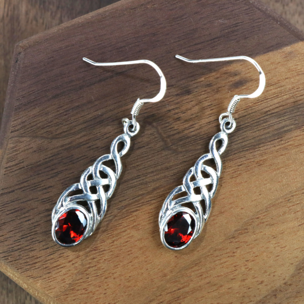 A pair of Celtic Knot Garnet Earrings.