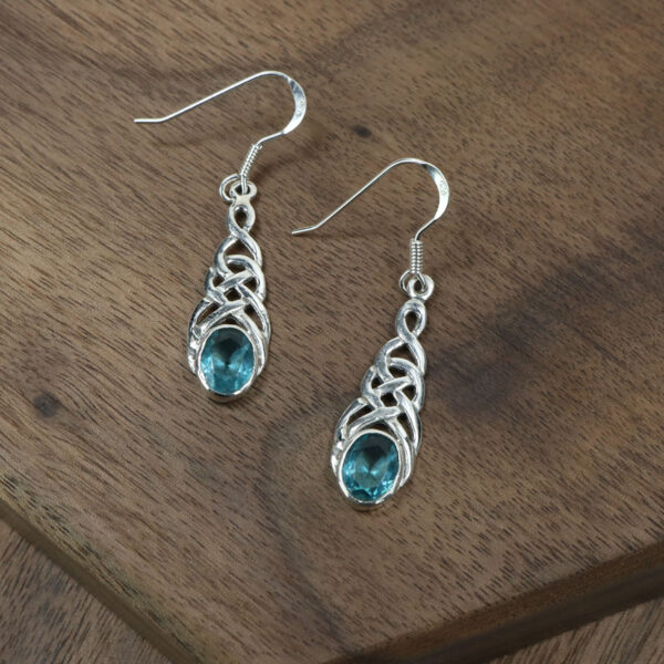 Triquetra Sterling Silver Earrings with Blue Topaz Stones.