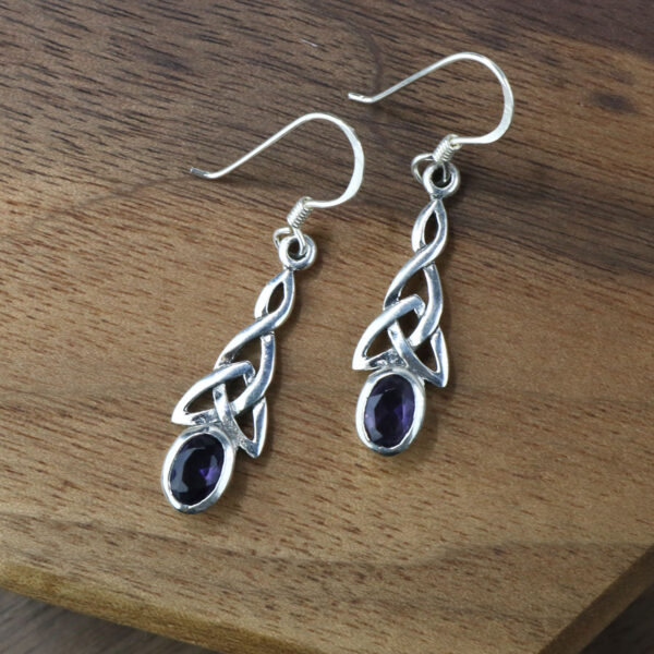 A pair of sterling silver Amethyst Triquetra earrings.
