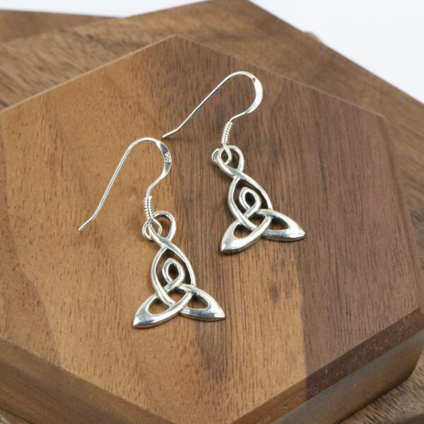 Triquetra Sterling Silver Earrings: A pair of Triquetra Sterling Silver Earrings featuring a celtic knot design.