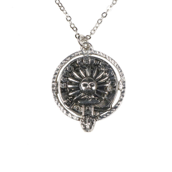 A Kerr Clan Crest Necklace with a skull and crossbones on it.