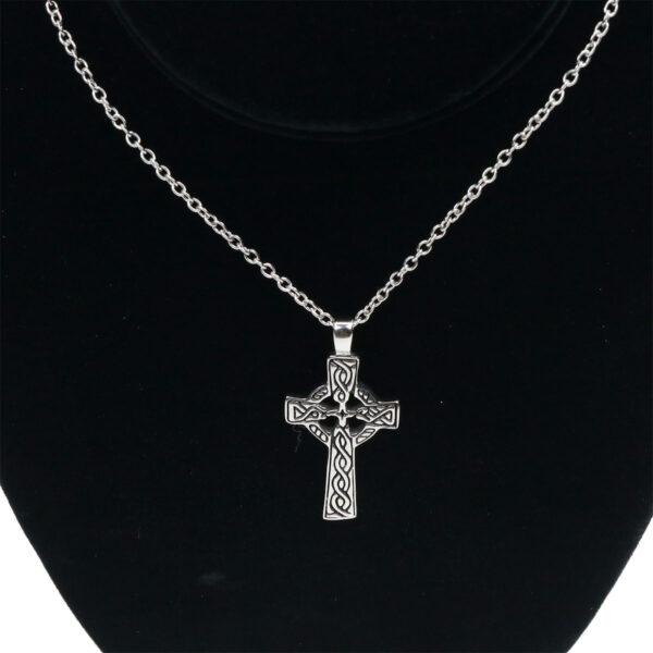A Stainless Steel Celtic Cross Necklace on a mannequin.
