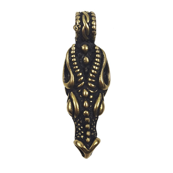 A black and gold Dragons Head Pendant.