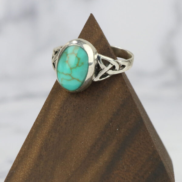A stunning Turquoise Triquetra Ring* crafted in sterling silver.