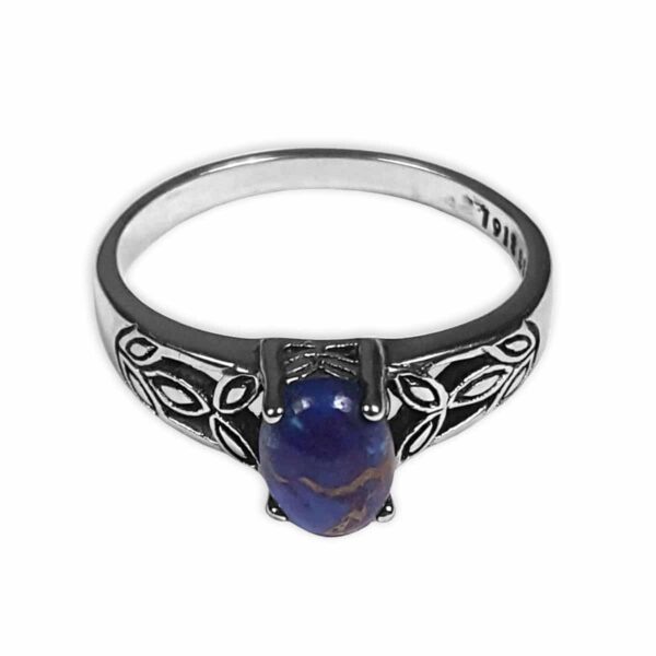A Purple Mohave Turquoise Triquetra Ring with a blue lapis stone.