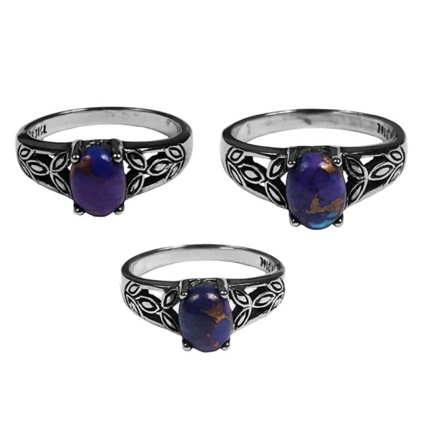 A set of three Purple Mohave Turquoise Triquetra rings with a stone.