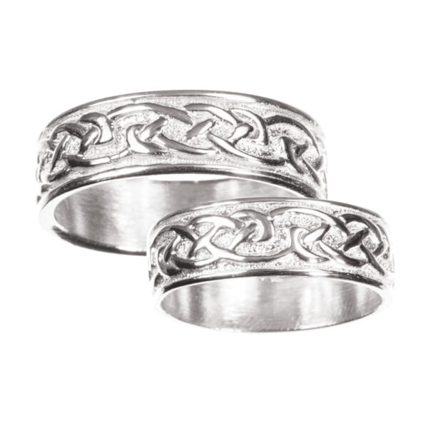 A pair of Womens Sterling Silver Celtic Wedding Bands.