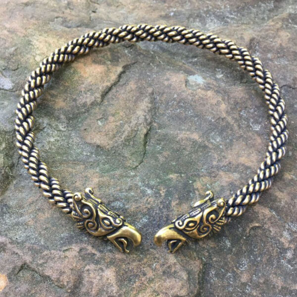 A Celtic Griffin Neck Torc adorned with two eagle heads.