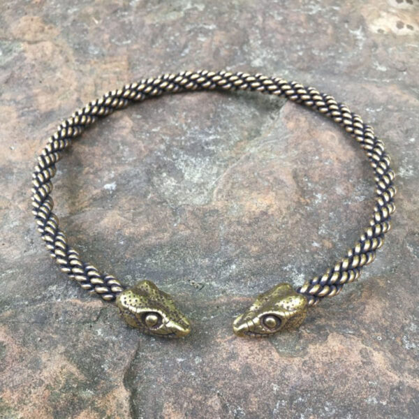 A Celtic Snake Torc - Medium Braid bracelet with two intricately designed snake heads on each end.