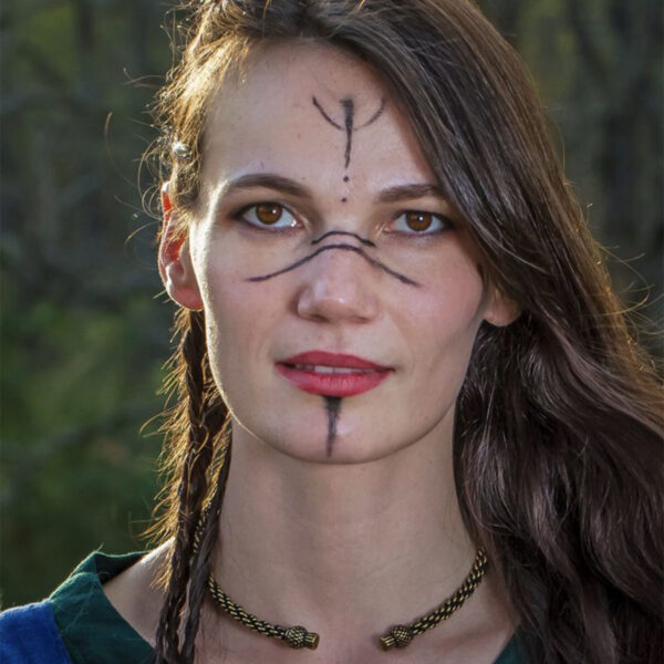 A woman wearing a viking costume adorned with a Celtic Thistle Neck Torc.