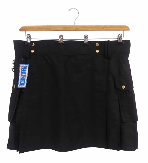 A black kilt with a gold tag on it.