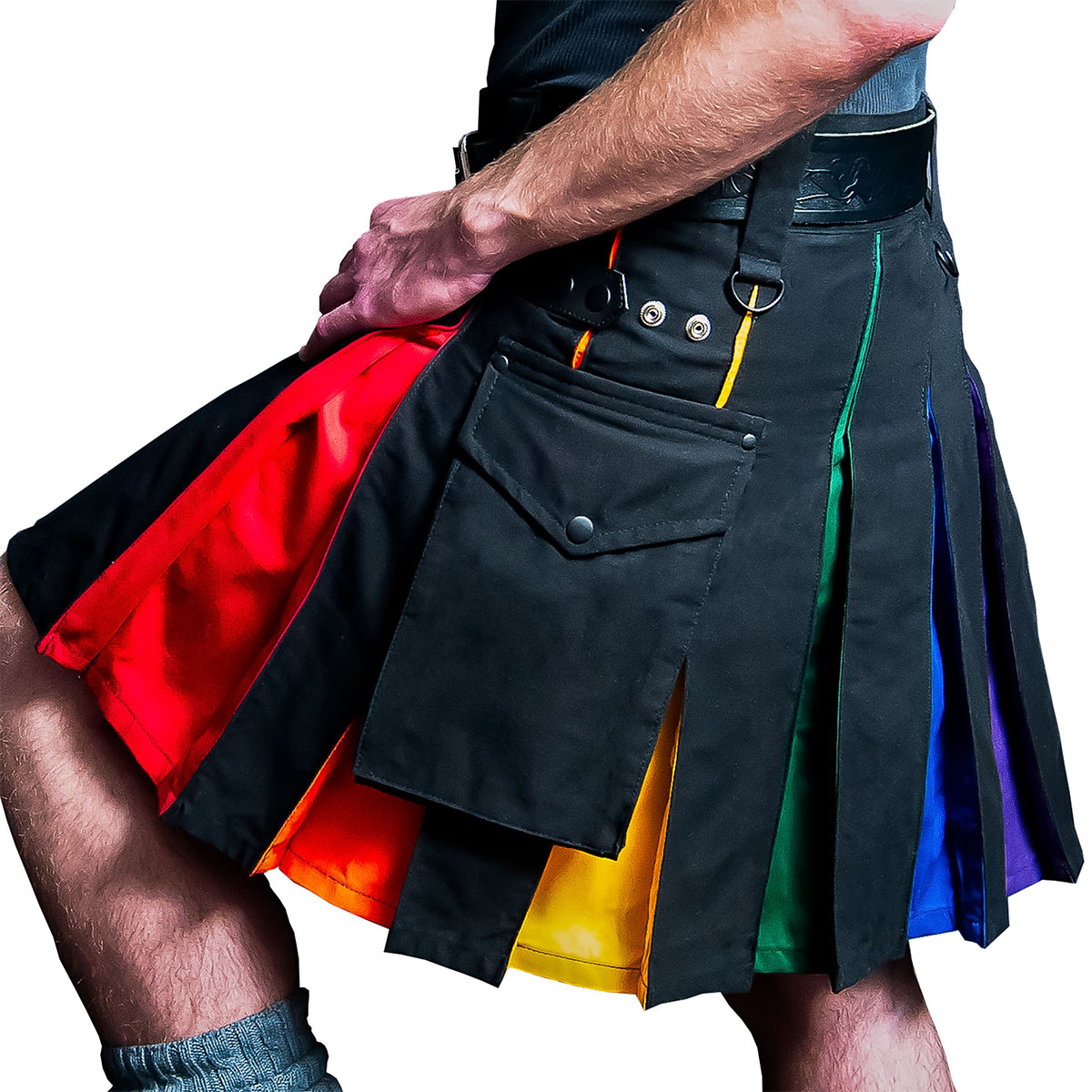 A man wearing a Rainbow Pride Canvas Utility Kilt.