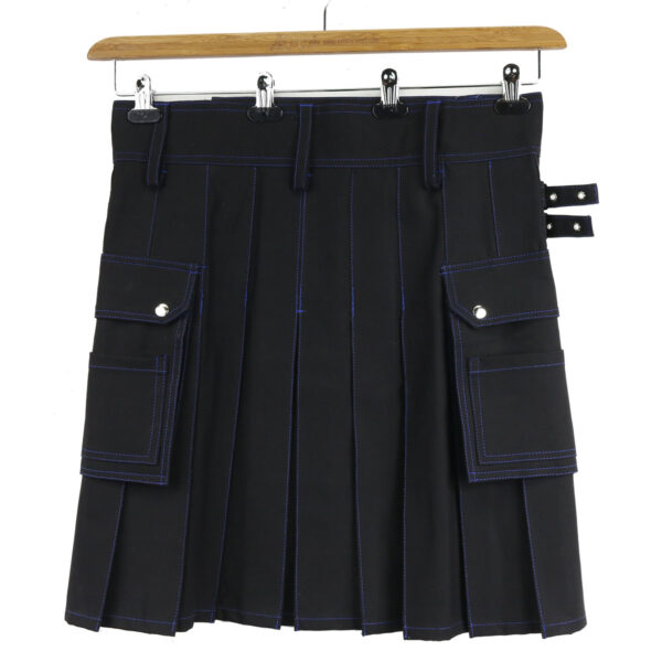 A black pleated skirt hanging on a hanger.
