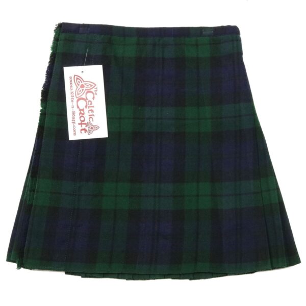 A green and black plaid kilt with a tag on it.