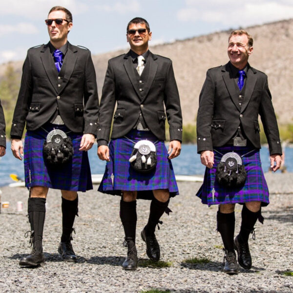The men are wearing kilts in the Argyle Formal SILVER Package.