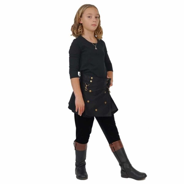 A young girl wearing Wilderness Kilts for Kids.
