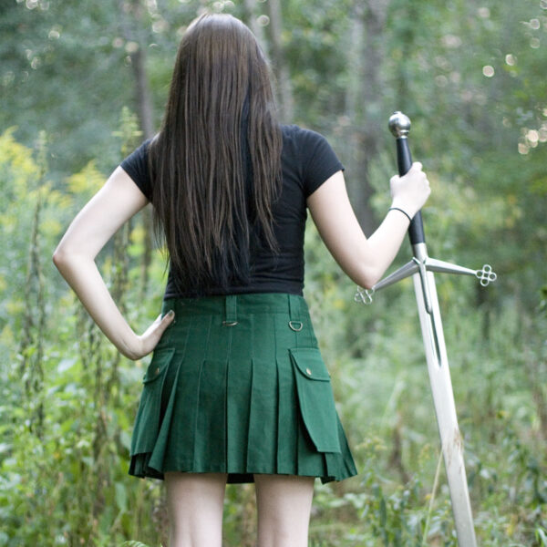 A girl in a Ladies Wilderness Mini Kilt, bravely navigating the wilderness.
