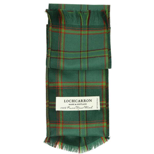 A green plaid scarf with a label on it.