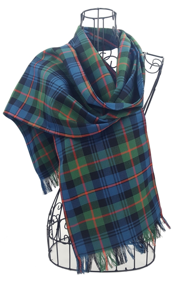 A wool-free tartan scarf on a mannequin.