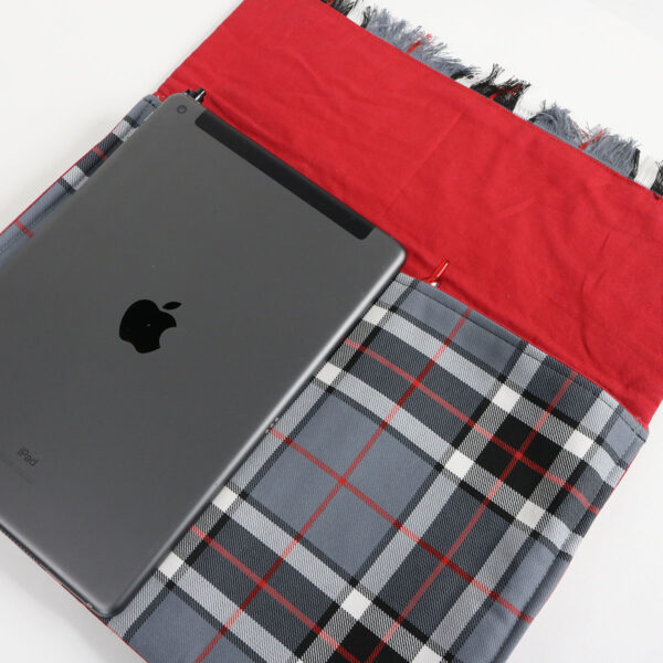 A Tartan Folio - Poly/Viscose Wool Free iPad sleeve crafted using Poly/Viscose and Wool Free fabric, with an iPad securely encased within.