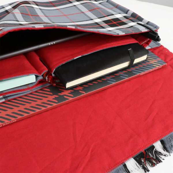 A red and black Tartan Folio - Poly/Viscose Wool Free bag with a notebook inside.