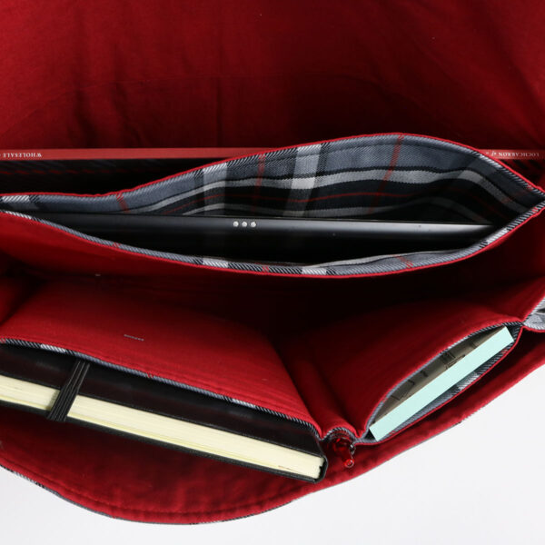 The inside of a Tartan Folio - Poly/Viscose Wool Free bag with a laptop inside.