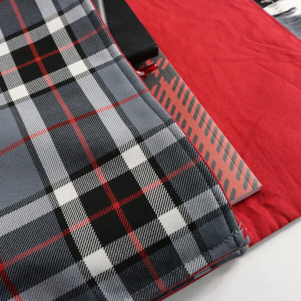 Modified Description: A Tartan Folio - Poly/Viscose Wool Free blanket with a red and black checkered pattern.