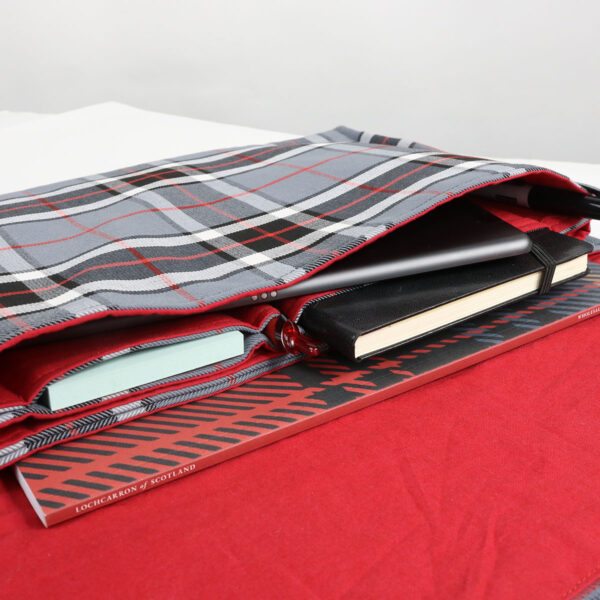 A Tartan Folio - Poly/Viscose Wool Free laptop bag with a red and black plaid pattern.