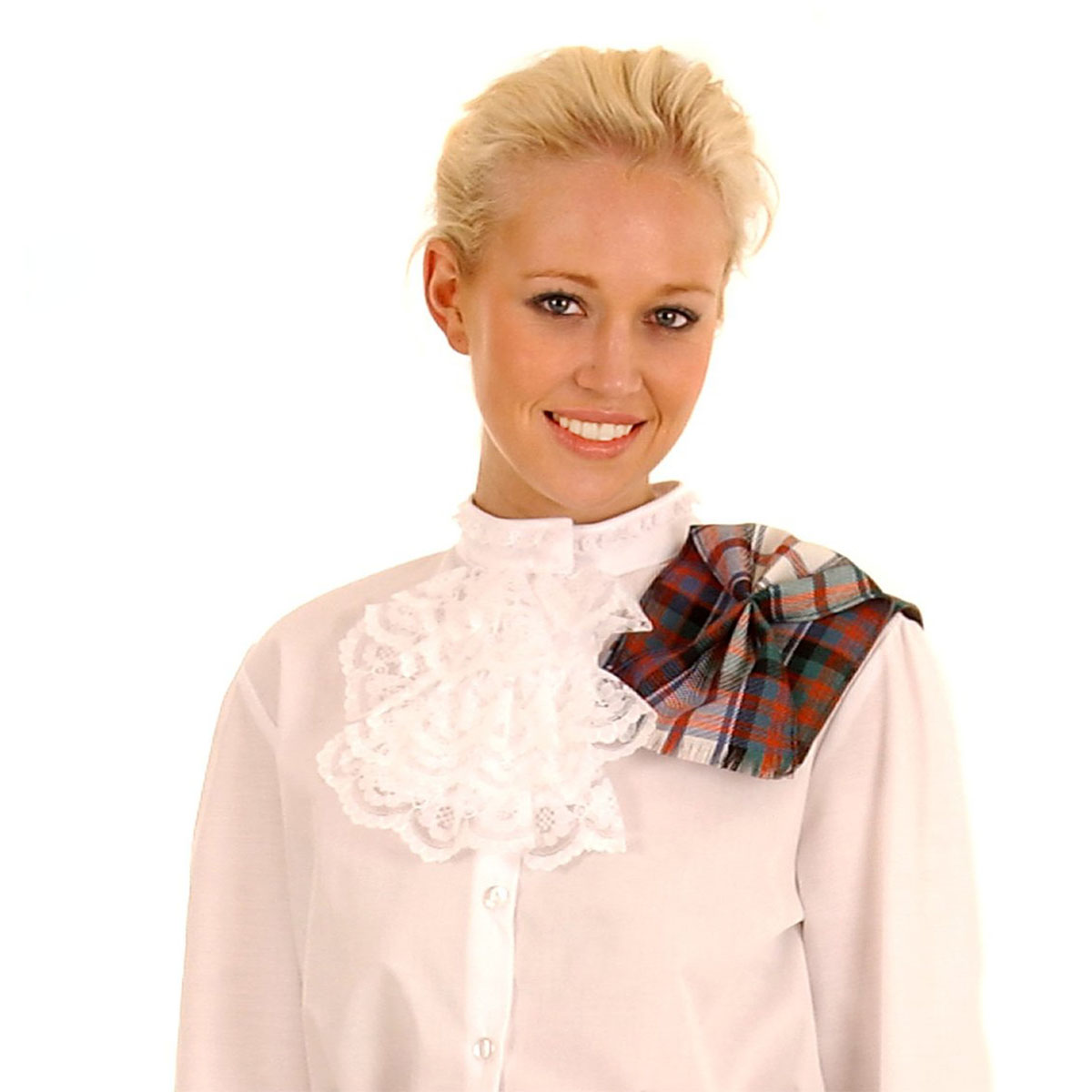 A woman in a white shirt with a tartan bow.