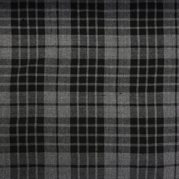 A close up of a black and grey plaid fabric.