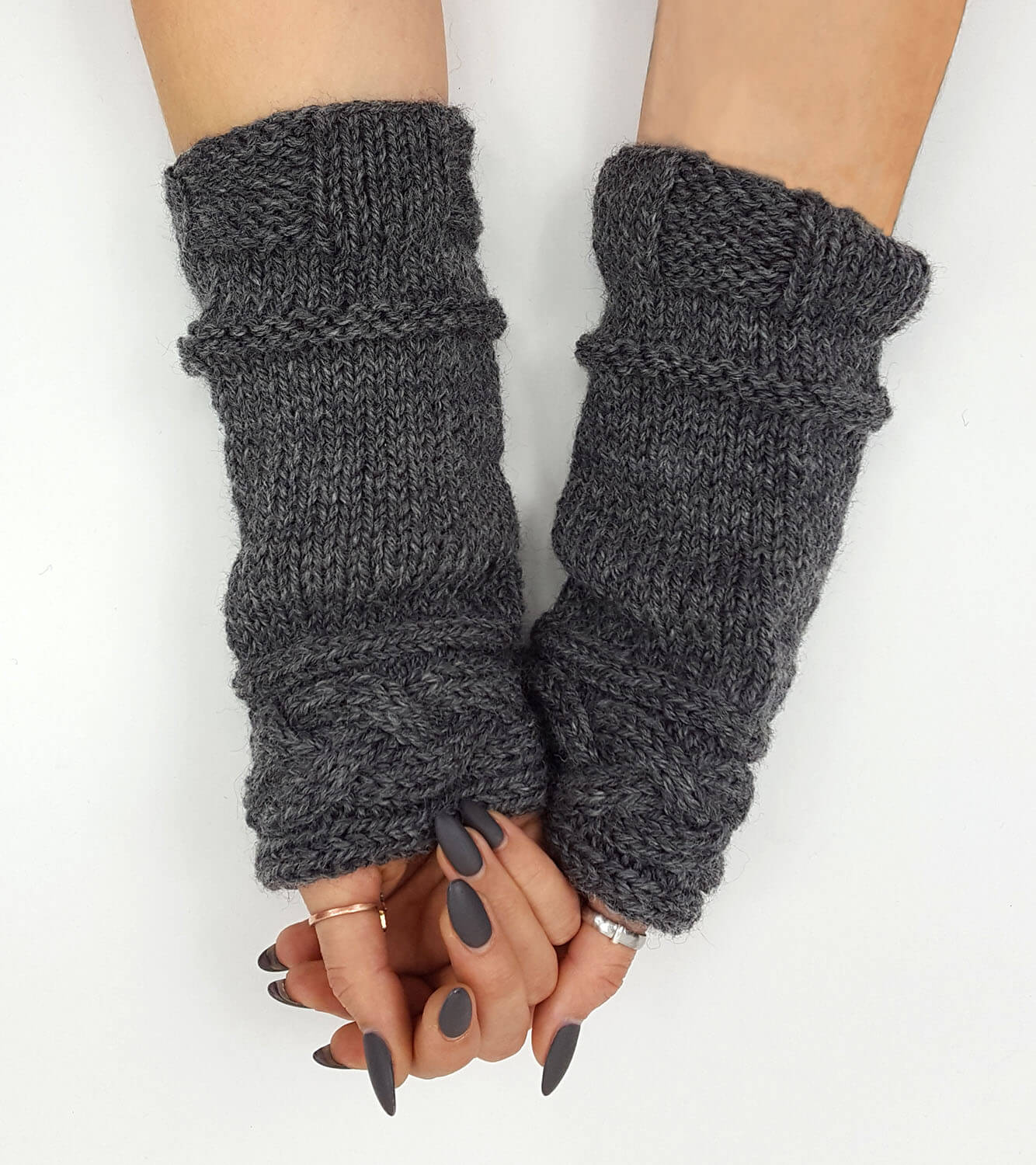 These 100% wool wrist warmers are lovingly hand-knit in the USA. Inspired by the arm cuffs that Claire wears in OUTLANDER: The series. Wear it for your love of OUTLANDER or just for warmth and style. Measures approximately 4.5" x 9"