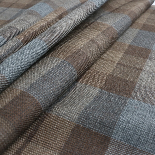 A close up of an OUTLANDER Authentic Premium Wool Tartan fabric.