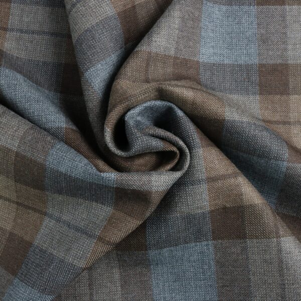 A close up of a blue OUTLANDER Authentic Premium Wool Tartan Fabric.