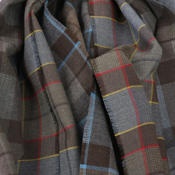 A close up image of a plaid scarf.