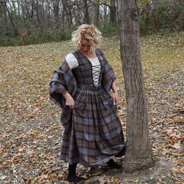 A woman in a renaissance dress standing next to a tree, wearing an OUTLANDER Inspired Custom-Made Hand-Knit Cowl.