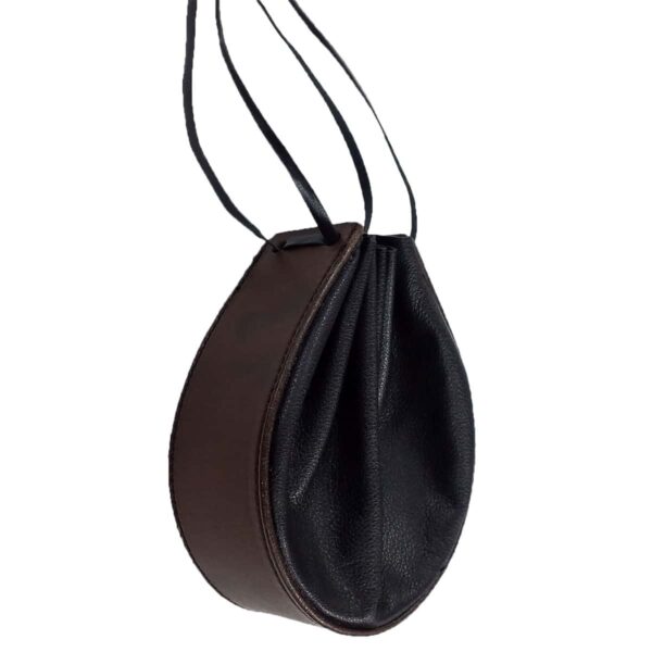 A brown and black Horseshoe Leather Pouch with a handle, reminiscent of a horseshoe leather pouch.