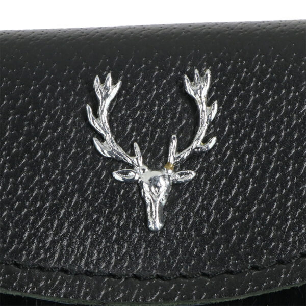 A Black Rabbit Fur Stag Sporran wallet with a deer head on it.