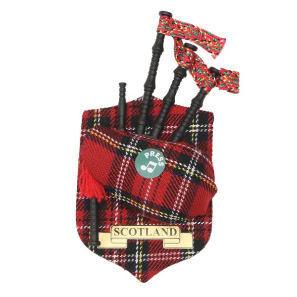 Musical Bagpipe Magnet featuring Musical Bagpipe Magnets on a red tartan.